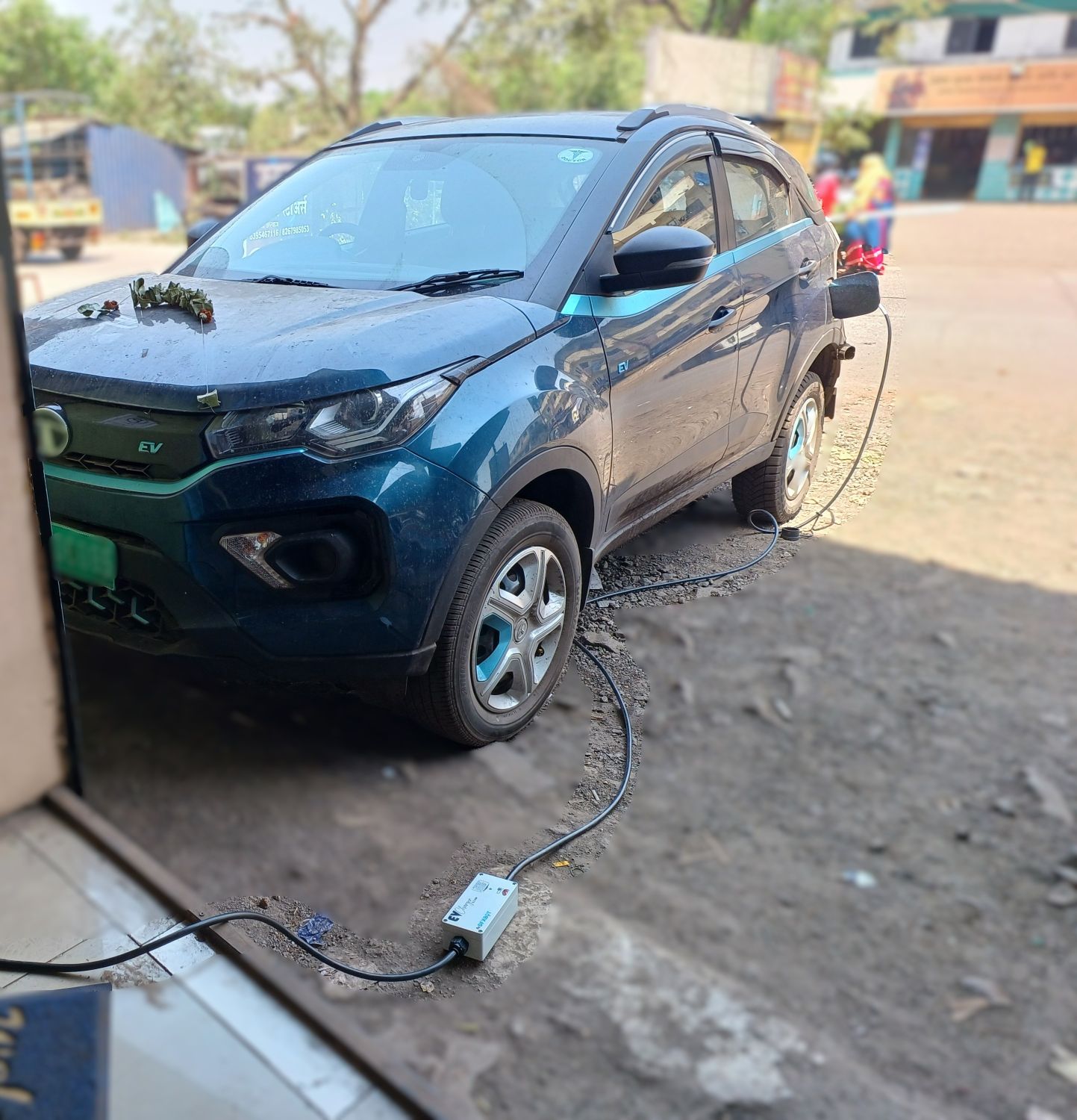 Car charging with DFXBOT Portable EV Charger – Compact, Waterproof, and Made in India